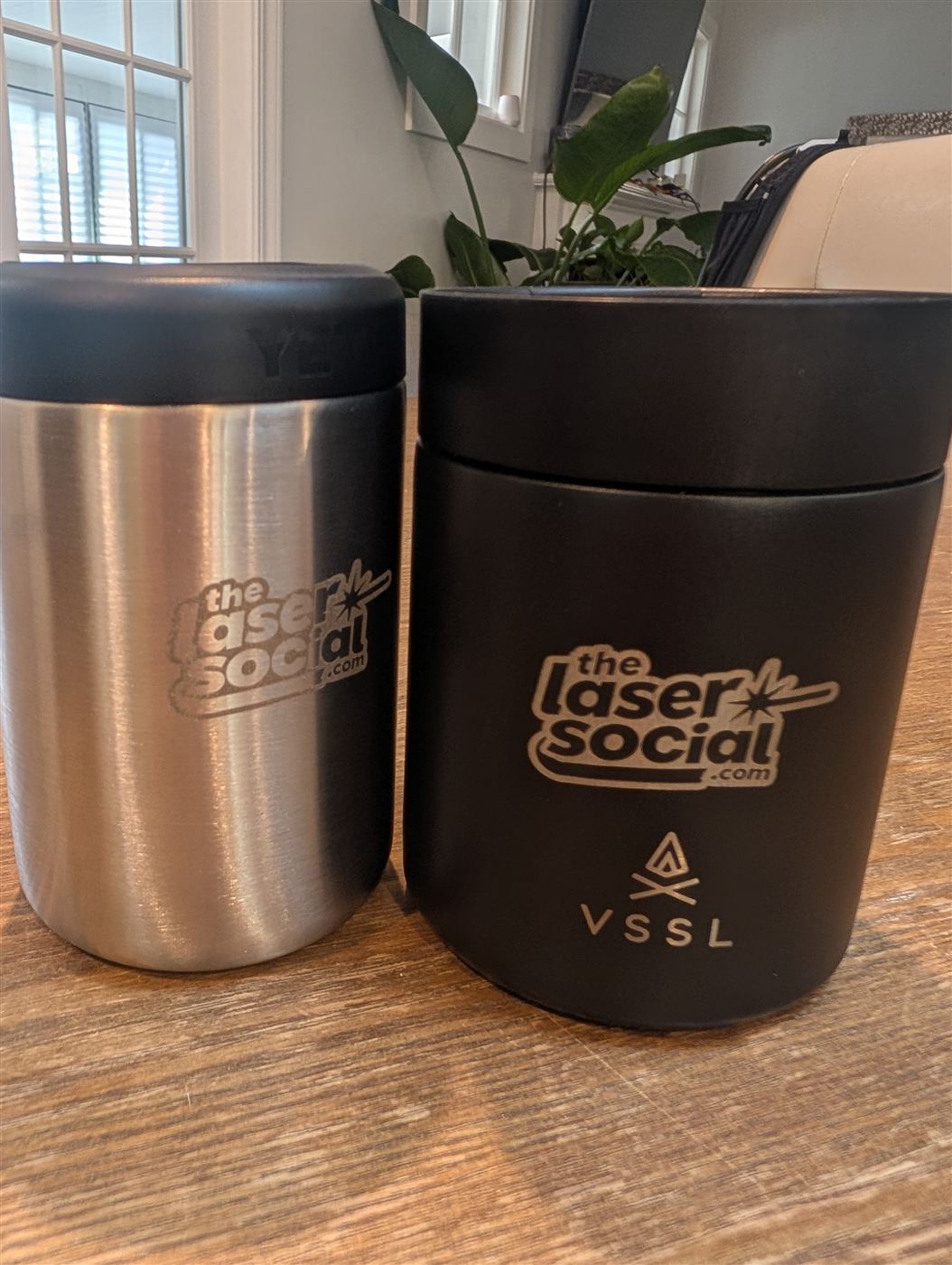 Insulated drink holders engraved with The Laser Social logo